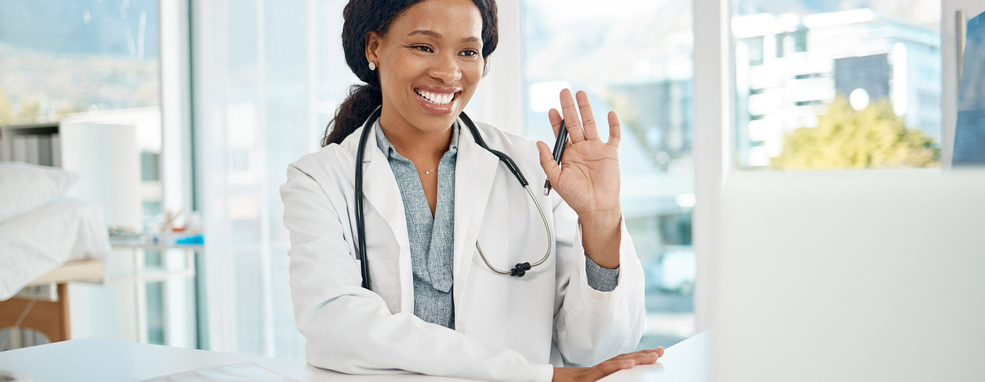 Doctor waving her hand