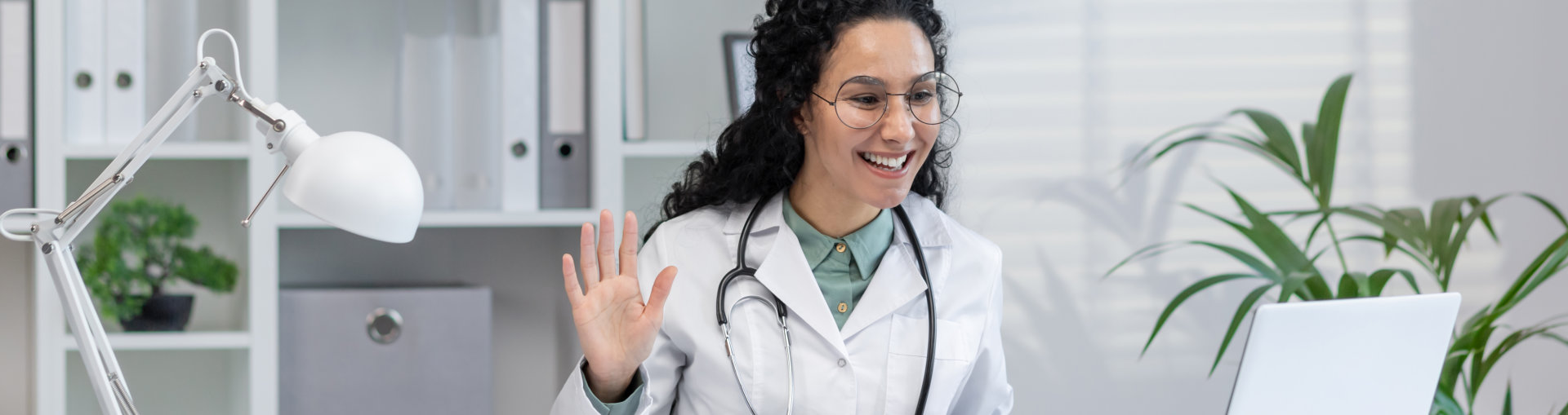 doctor waving her hands