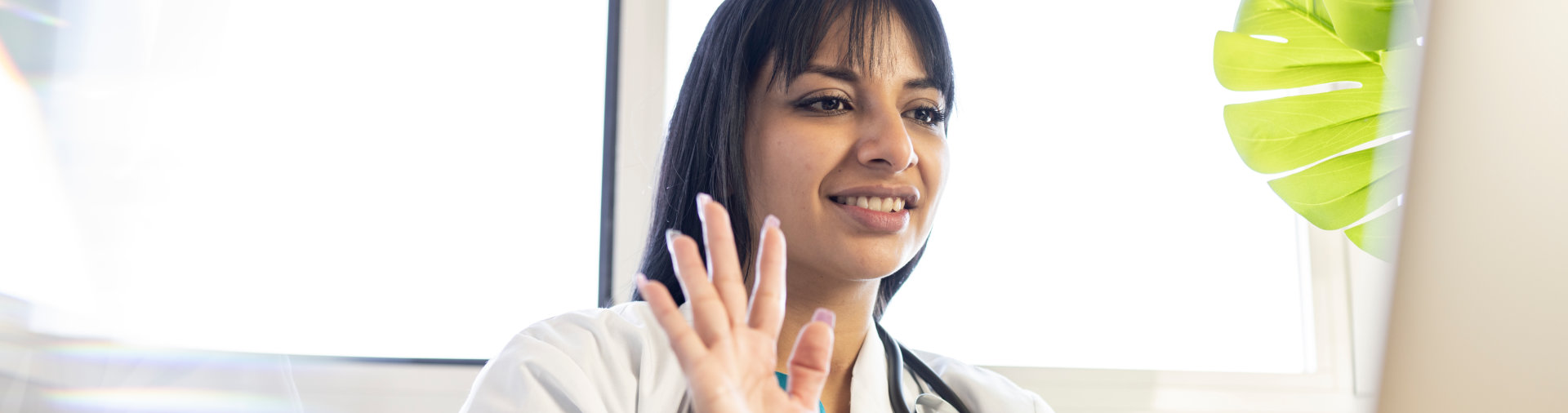 doctor waving her hands